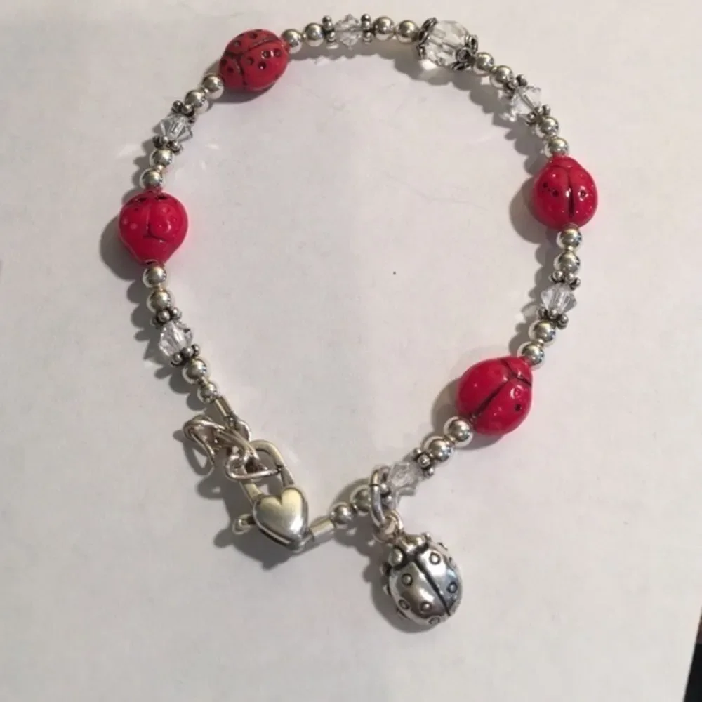 Sterling‎ ladybug bracelet with heart clasp